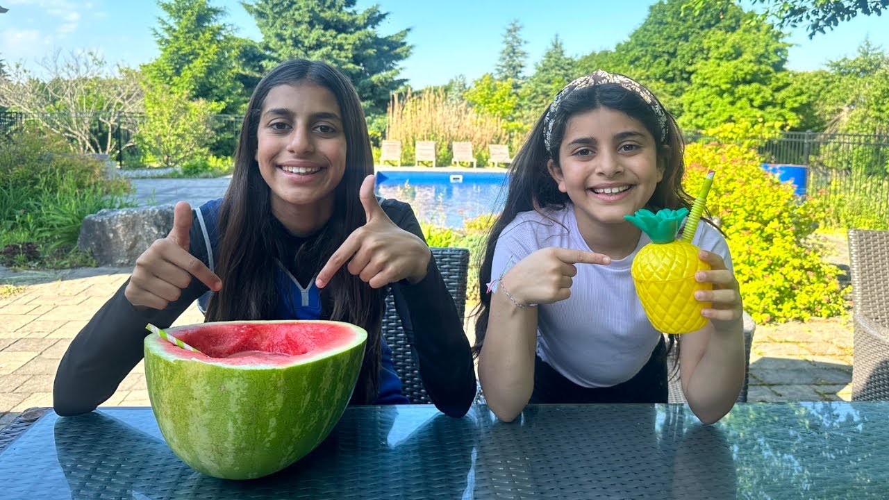 Sally teaches Deema to drink Healthy Fruit Smoothie