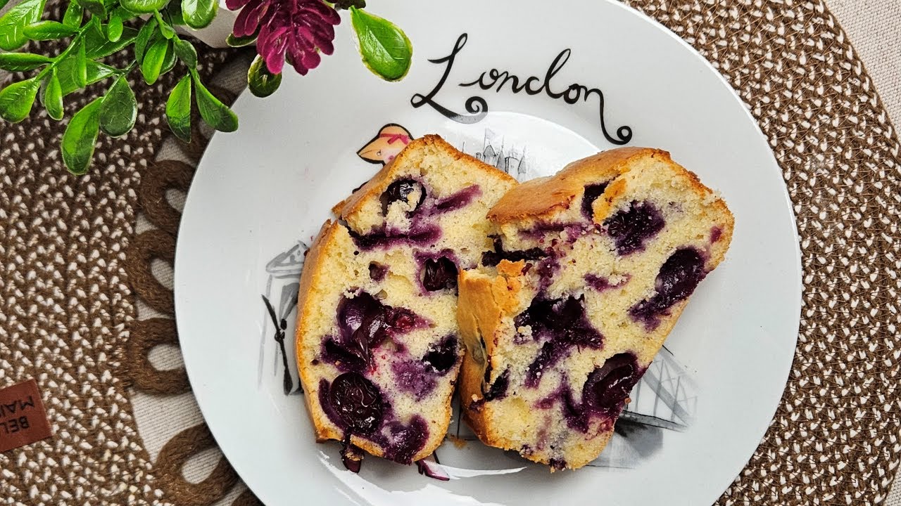 Lemon Blueberry Loaf Cake - Soft, Moist & Full of Berries!