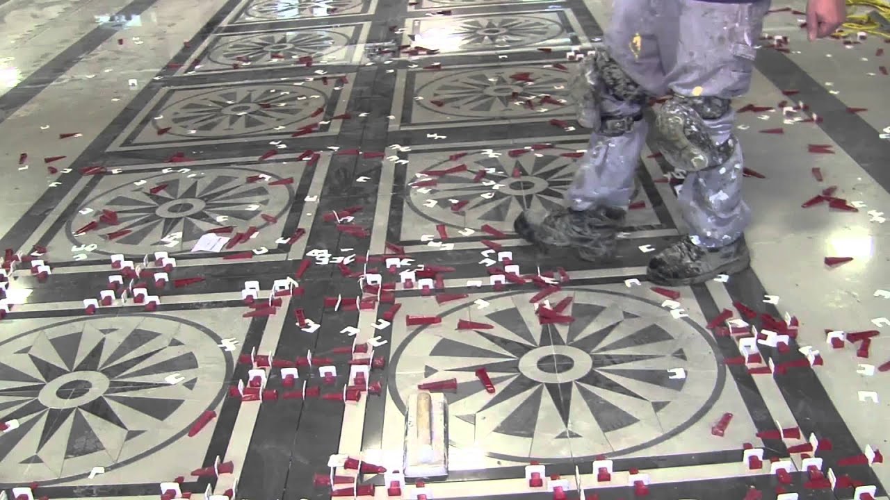 Distinctive tile design installation cut out on existing floor and T-Lock™ lippage free