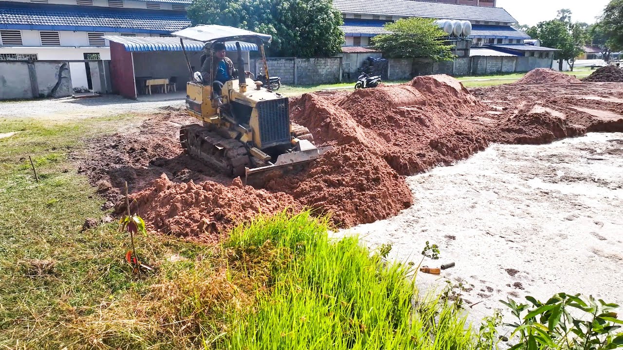 Started The project looks interesting. Using Mini Dozer Komatsu D20p pour soil into ponds