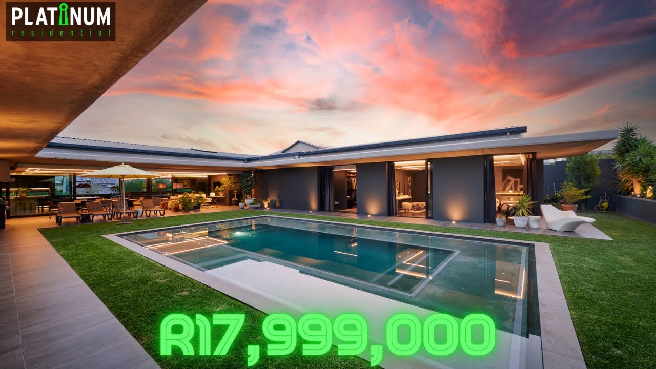 STUNNING MODERN HOME WITH AN 8-CAR GARAGE - A CAR ENTHUSIAST’S DREAM! IN WATERFALL COUNTRY ESTATE