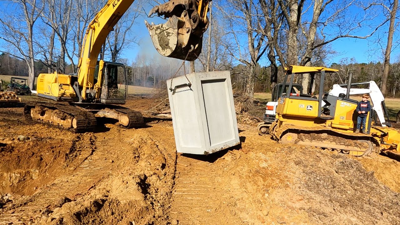 60 ACRES - working on Pond dam outlet structure