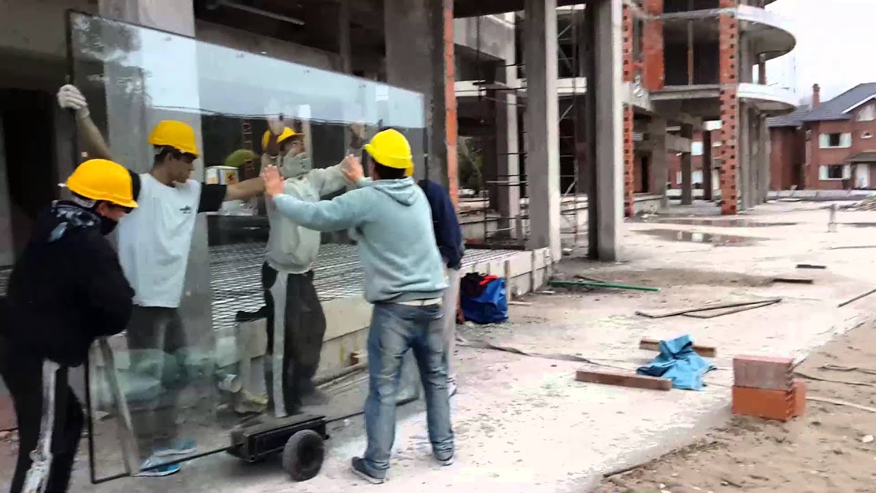 Izajes vidrios DVH con guinche eléctrico