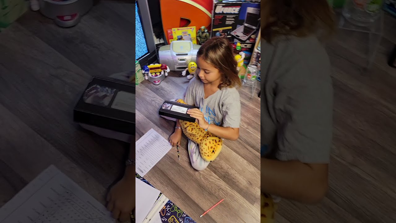 Showing my 8 Year Old How to Use VHS Tapes
