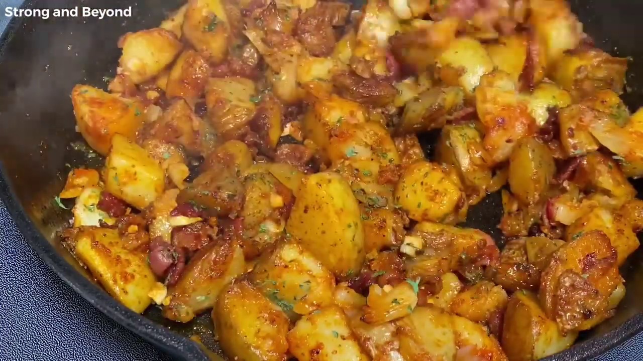 Cast Iron Fried Garlic Potatoes With Bacon And Onions