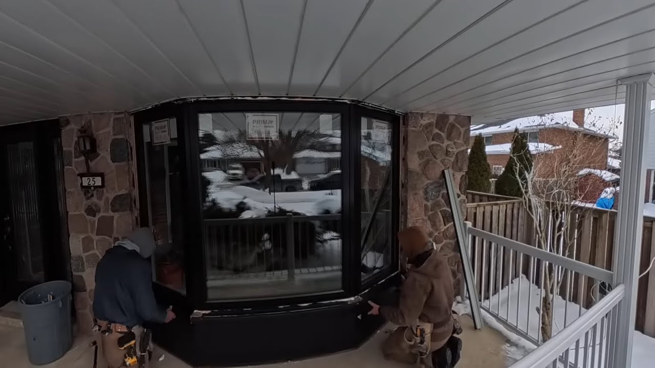 Custom black bay window installation done right.