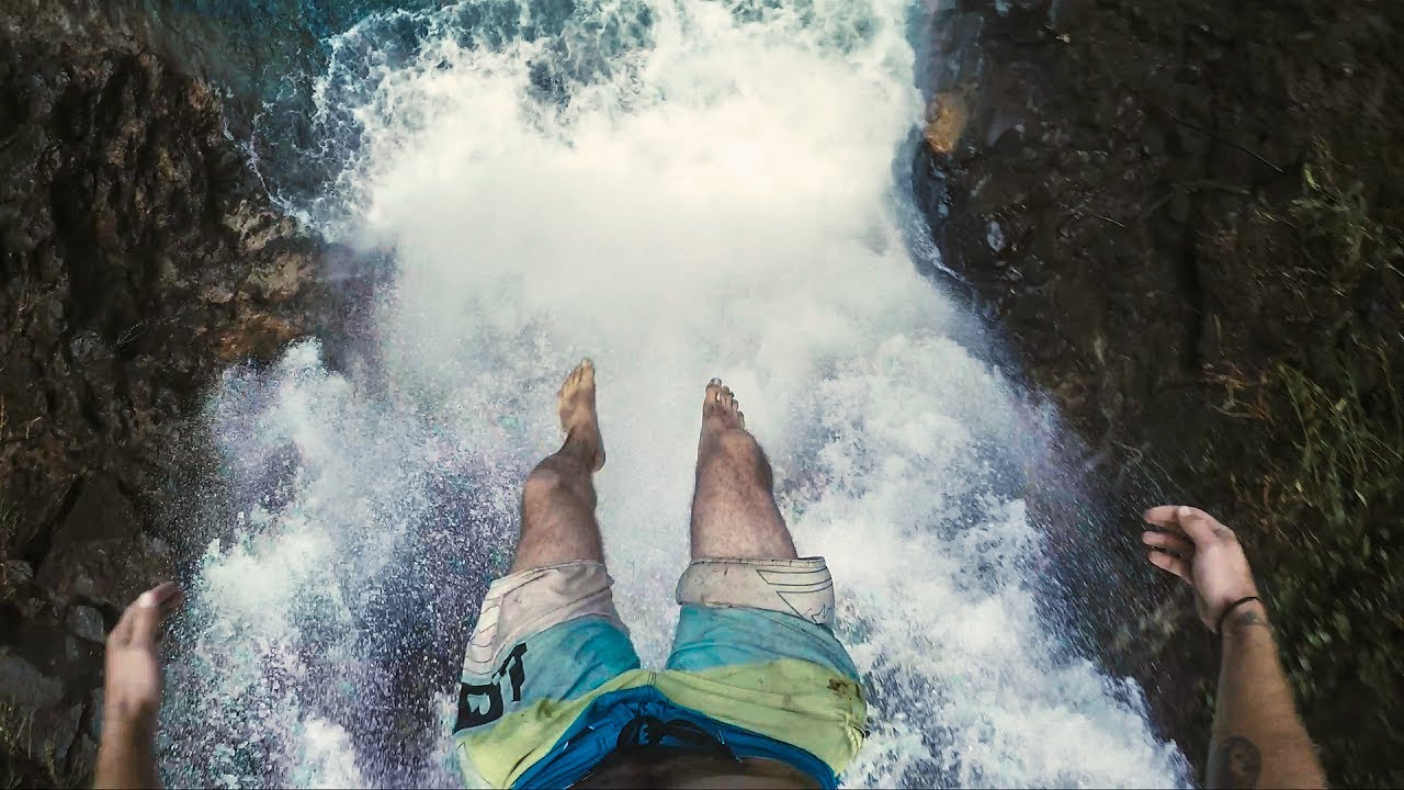 CLIFF JUMPING OFF 80 ft WATERFALL |  HAWAII (4k)