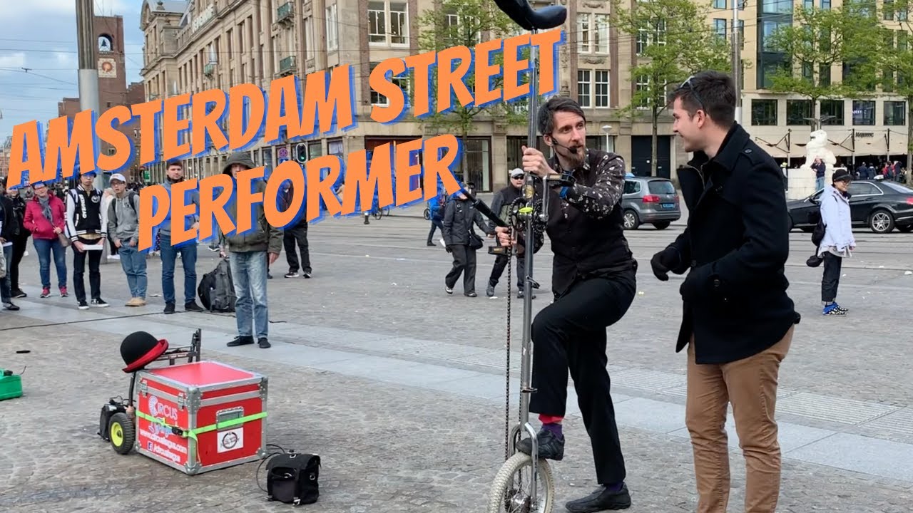 Fire Juggling Amsterdam Street Performer from May 2019