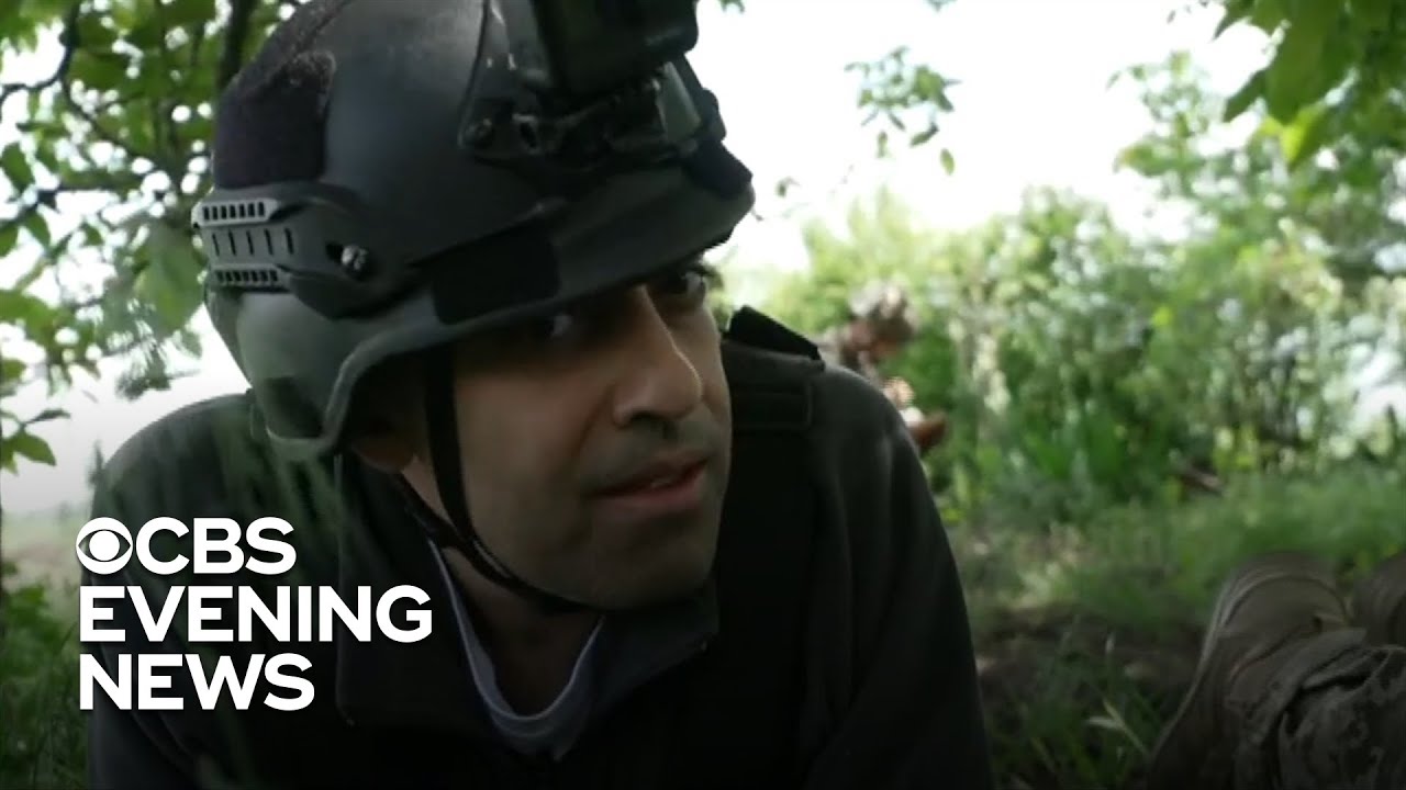 CBS News crew takes cover from Russian shelling