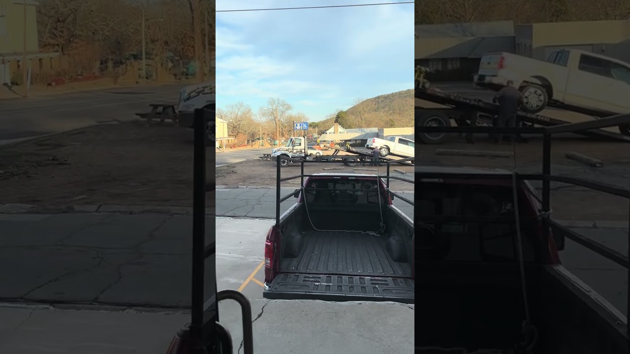 Pick*up truck being dropped off
