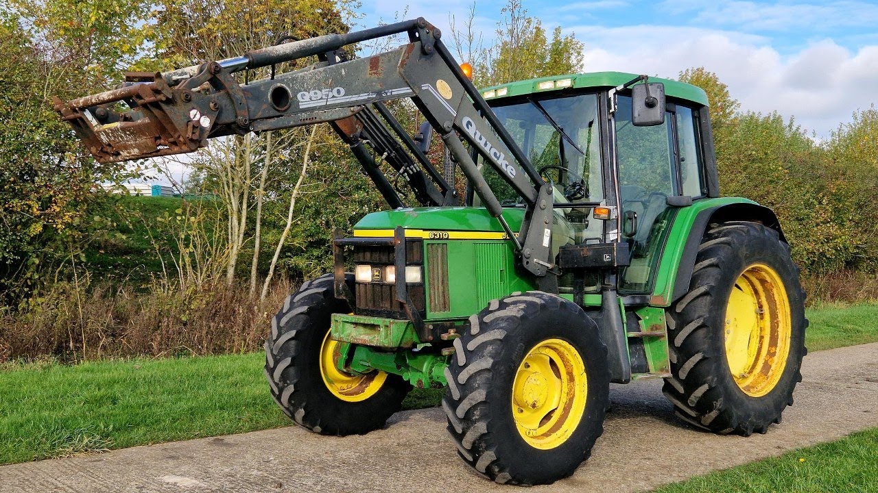 2002 John Deere 6310 with Quicke Q950 loader 23603