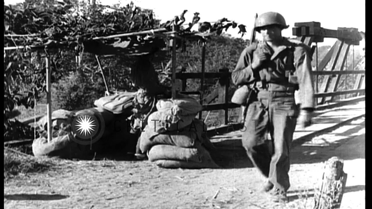 US 475th Infantry soldiers march into Man-Tha, south of Bhamo, in Burma during th...HD Stock Footage
