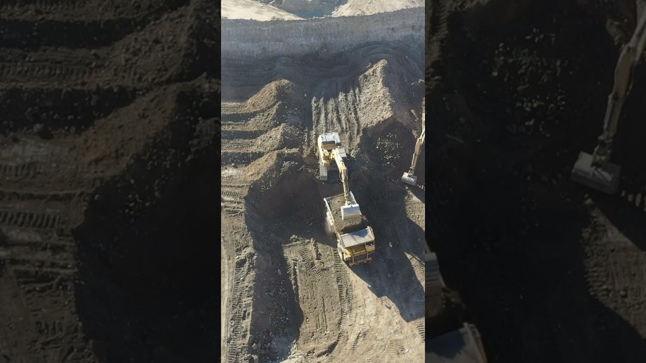 Bucket Attachment Close up scooping dirt and rocks hydraulic excavator #postmymachine