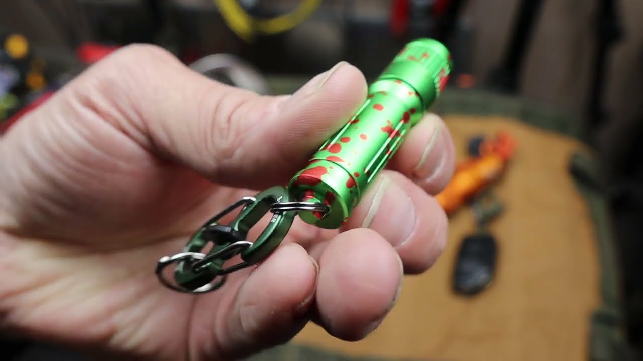 Брелок-фонарик Olight «Зомби-зеленый»: самый маленький. Самый часто используемый. Модели iXV, i1R...