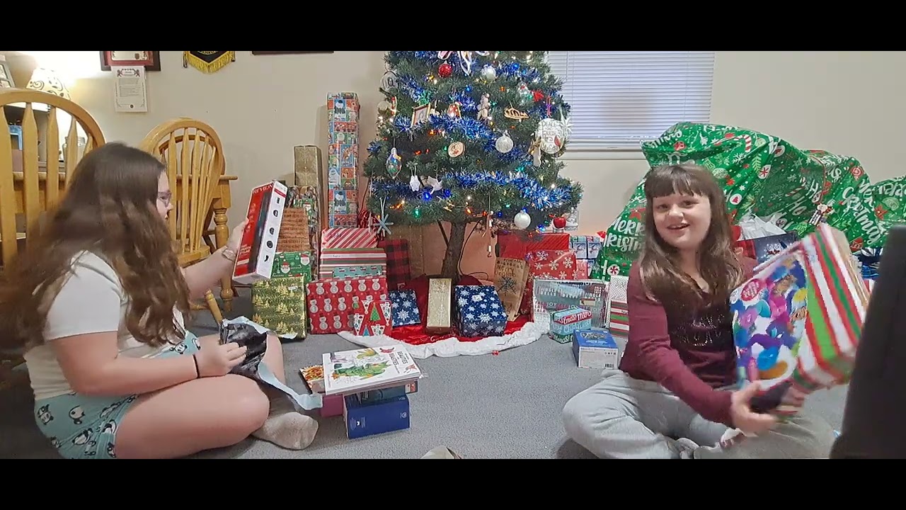 opening presents Christmas morning 2023