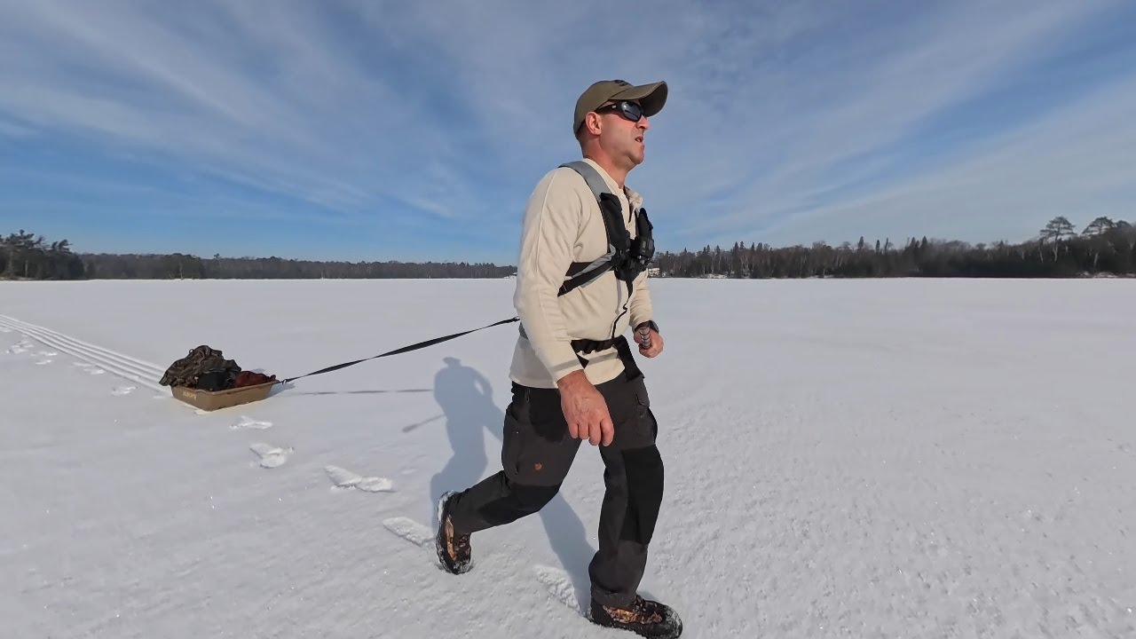 Solo wilderness ice fishing and campfire cooking end with a freezing mishap!