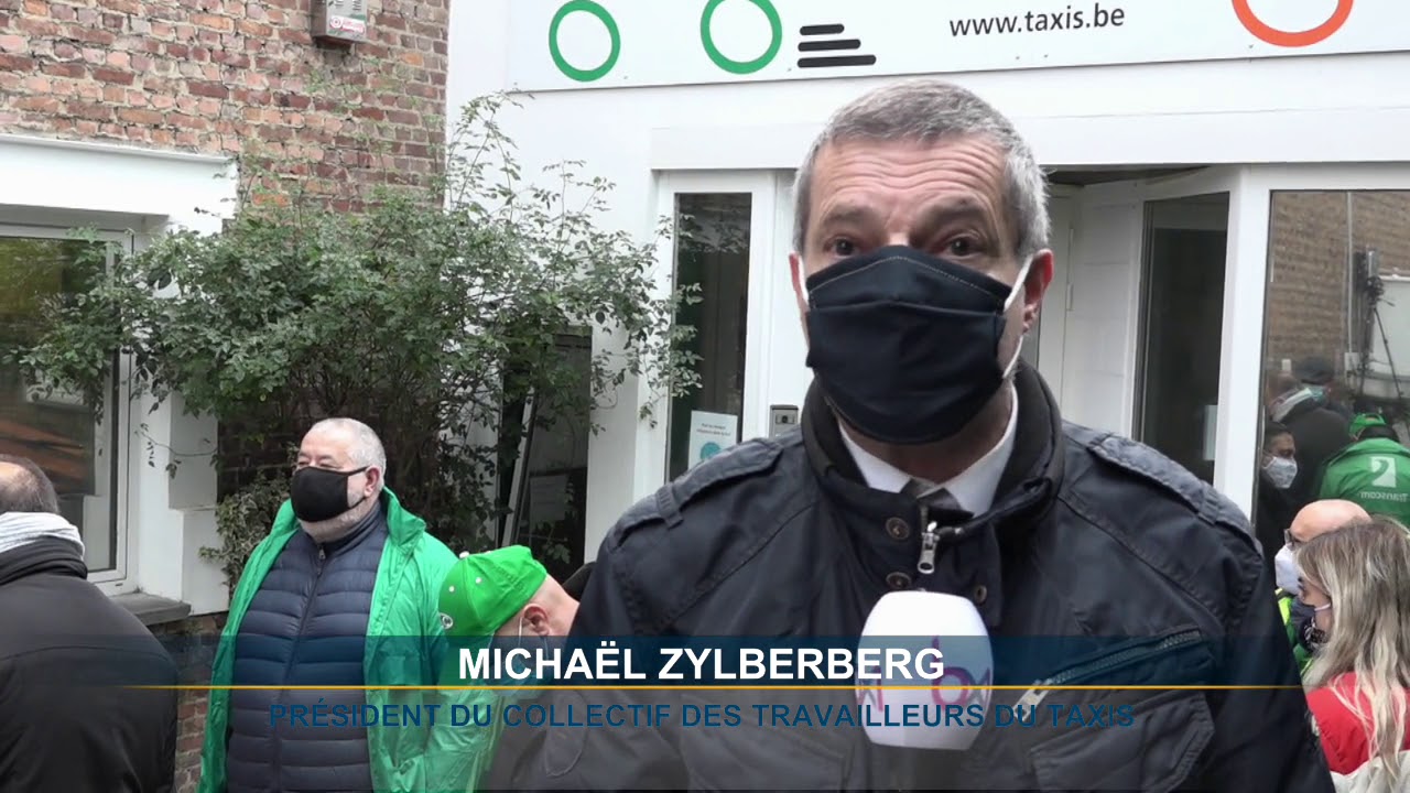 Des taximen indépendants manifestent devant le siège de Taxis Verts