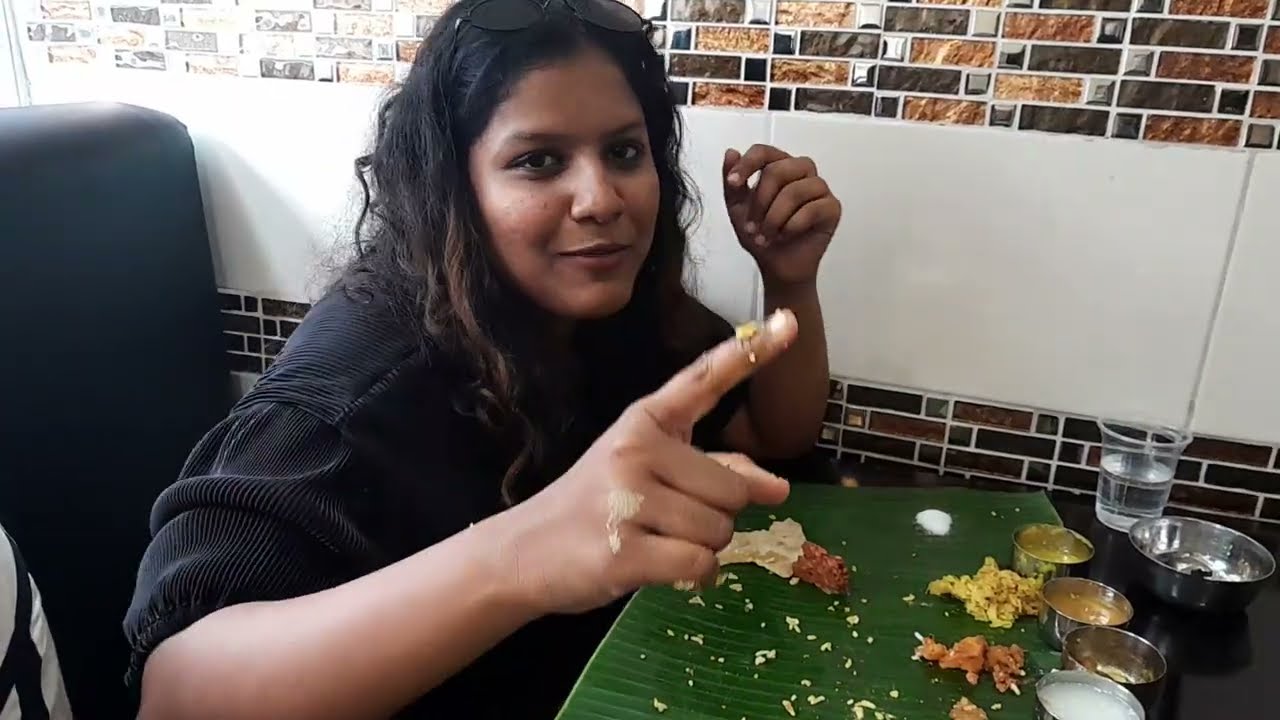 Cute Kerala girl enjoying Food in Bangkok,  South Indian food in Banana Leaf,