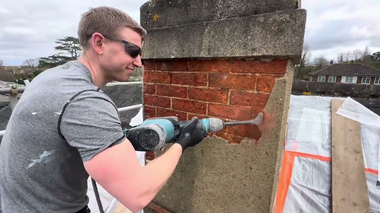 Damaged chimney stack rendering and crown replacement.