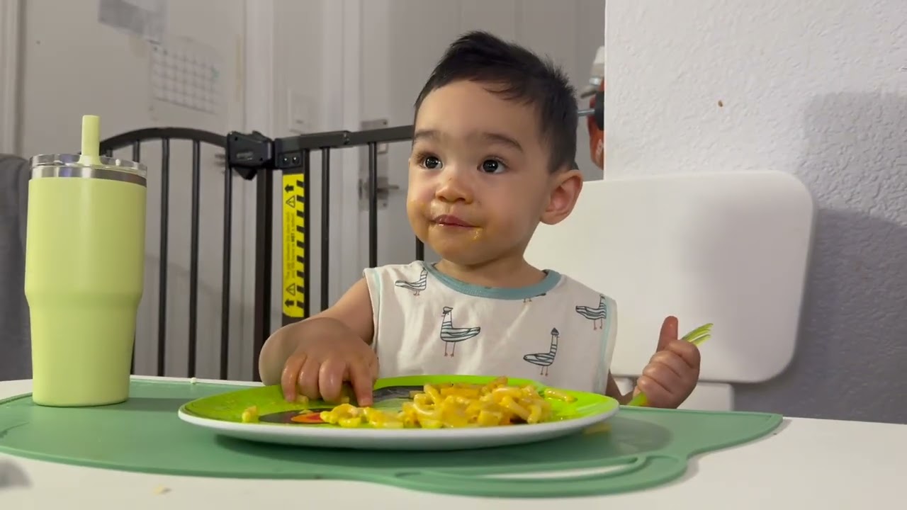 17 months old eating snacks (mac and cheese)