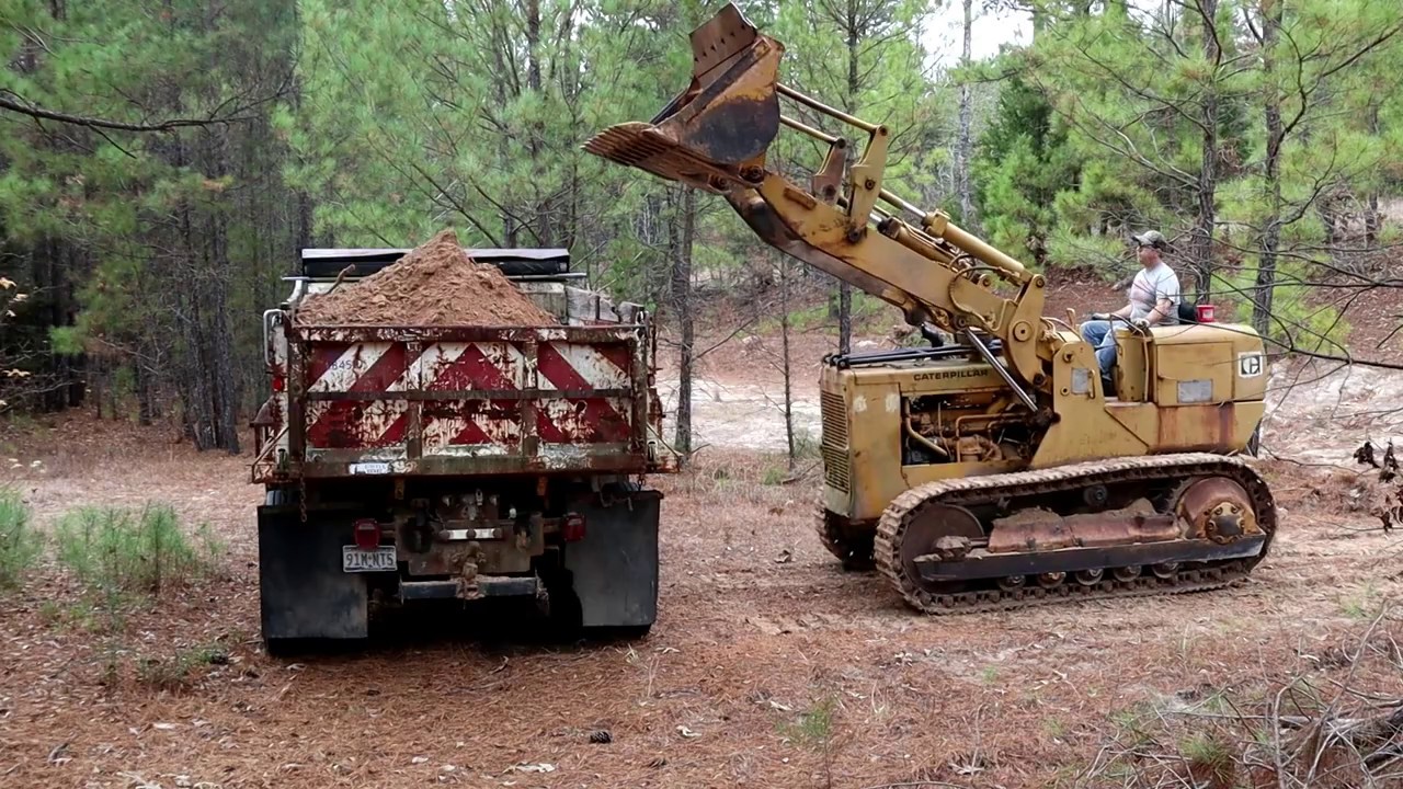 Best Way To Move Dirt Caterpillar Traxcavator Track Loader Ford F800