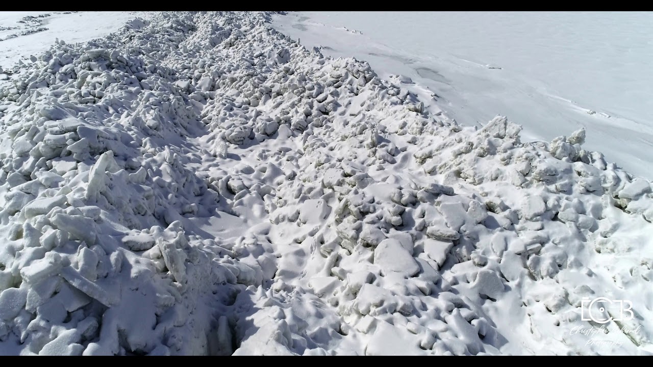 LAKE ERIE - GIANT ICE PILES/STACKING - 4K AERIAL - BUFFALO, NY 2019 WIND STORM
