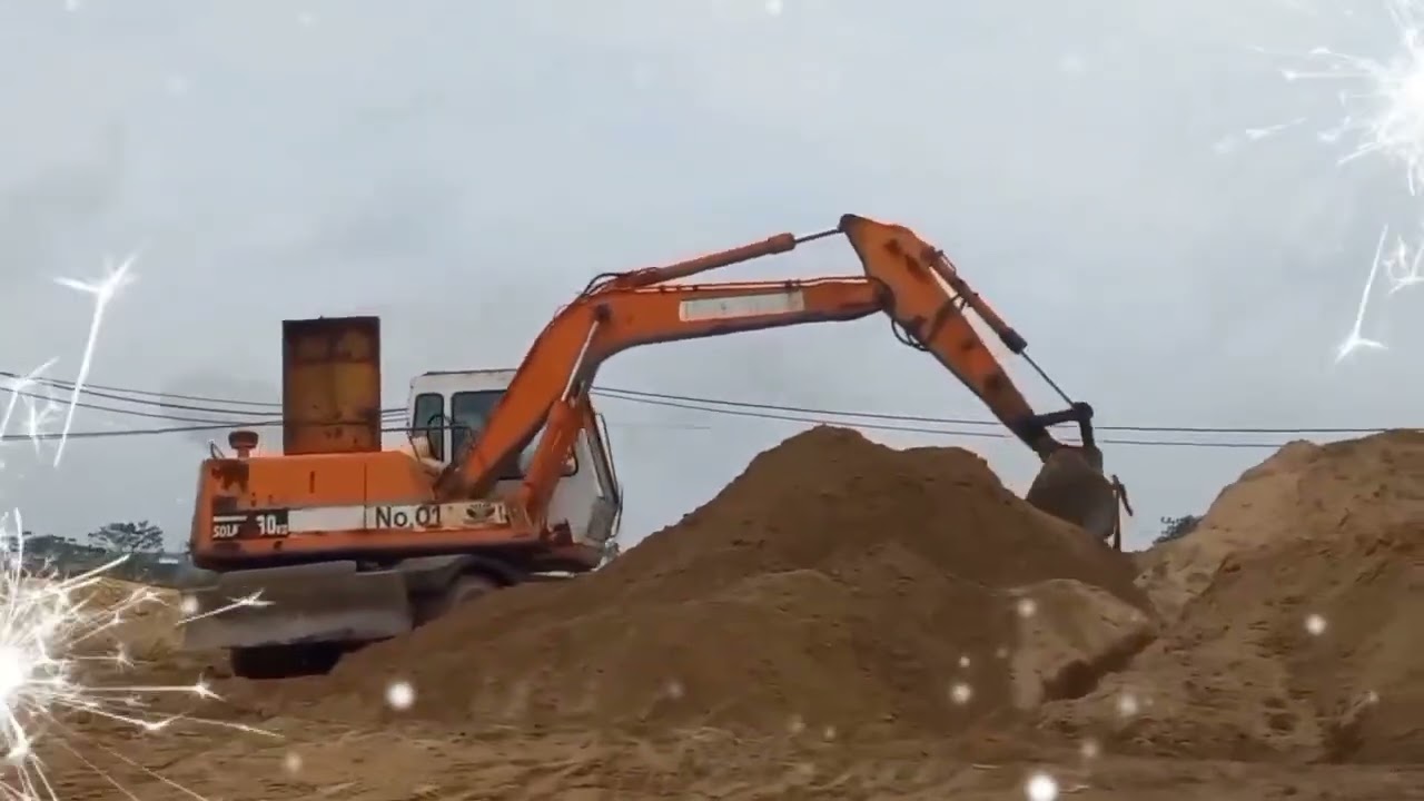 Máy xúc đào Em ghiền xem làm việc với cát
