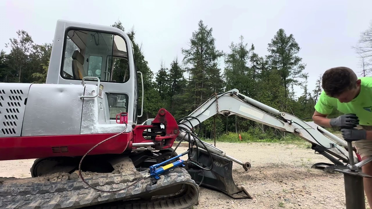 Removing king pins on excavator