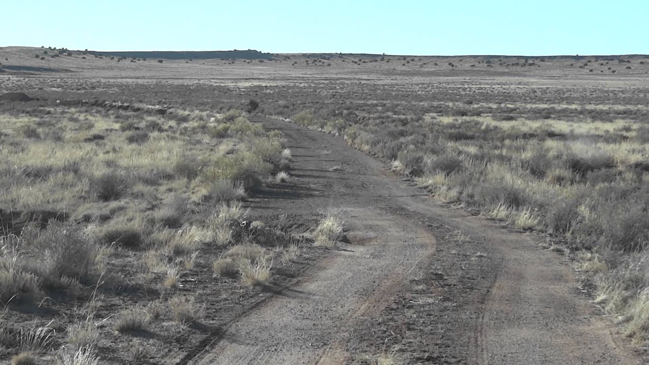 Driving on old Route 66 from Navajo, Arizona towards painted desert trading post