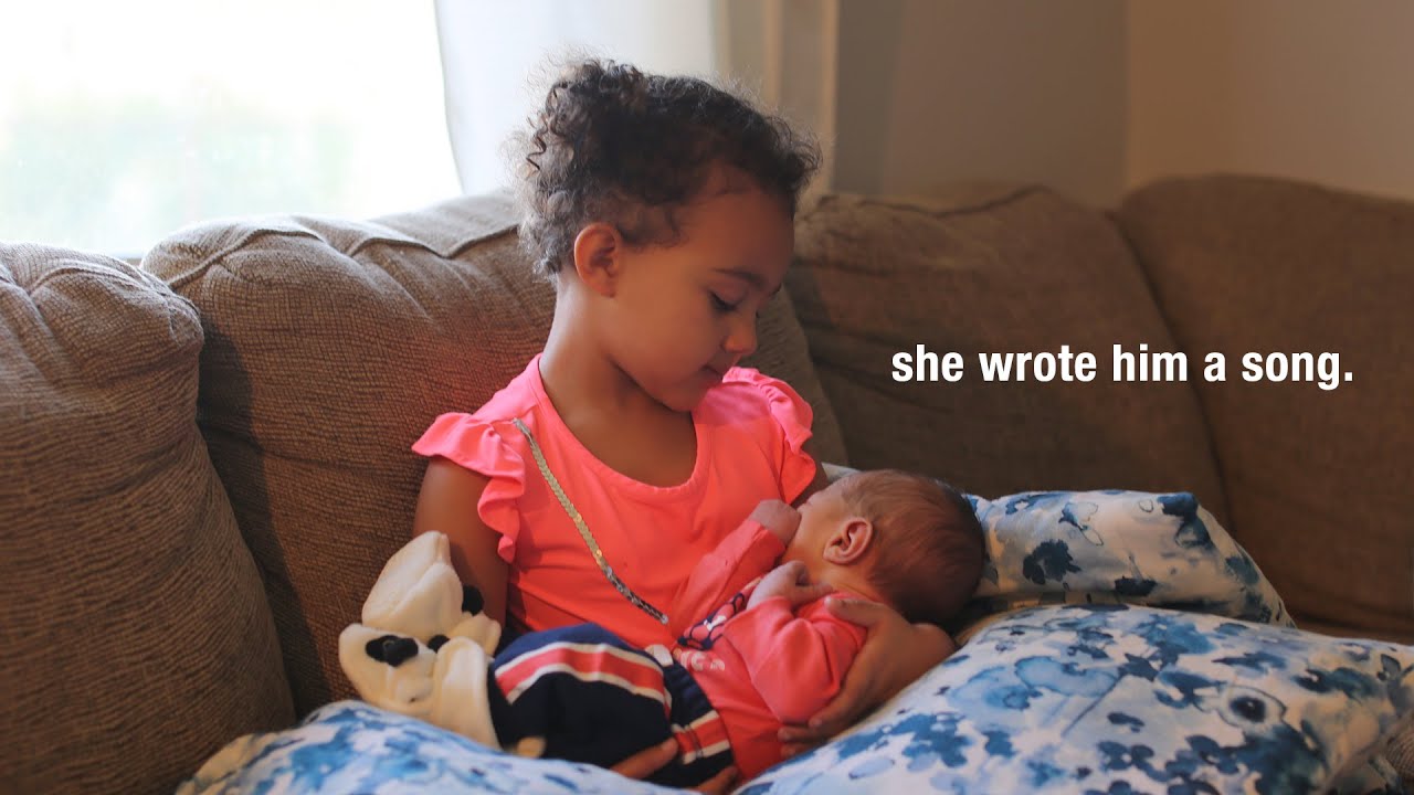 Big sister meets her little brother for the first time! *adorable*