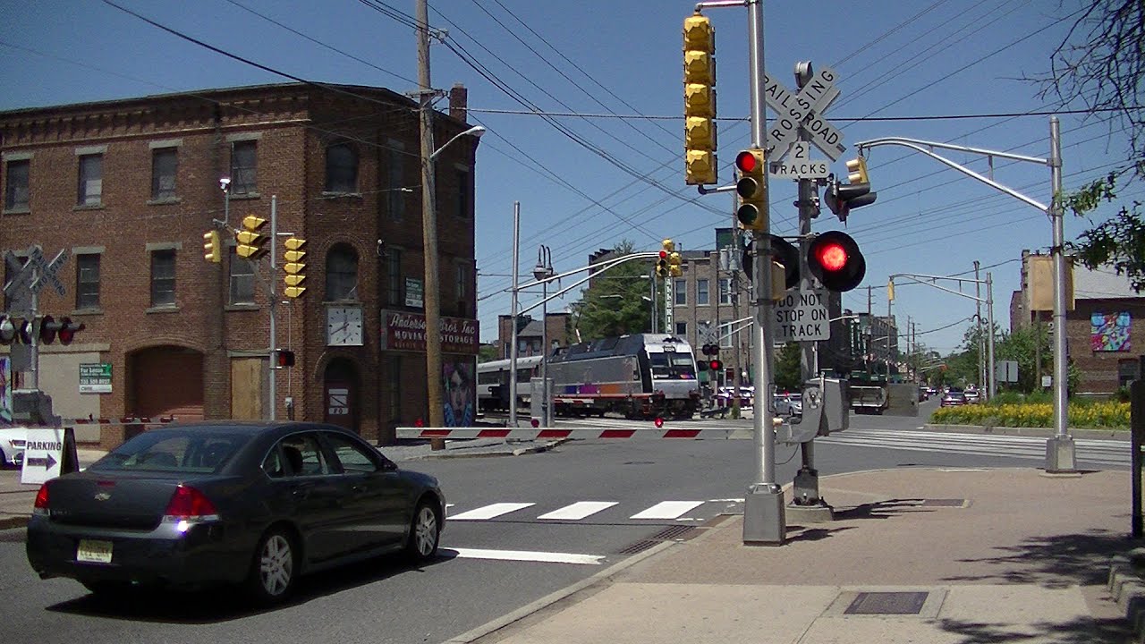 2 NJ Transit trains pass through 4-way crossing
