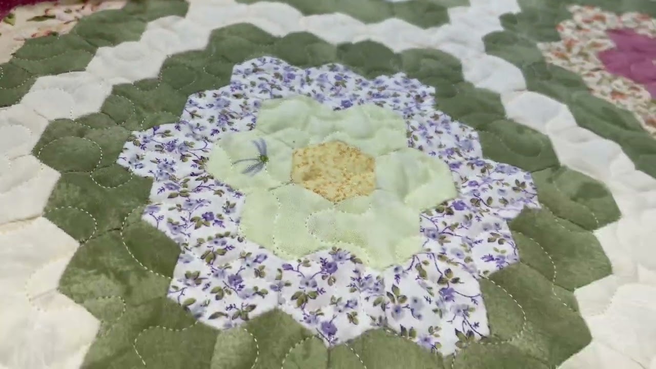 Cathie’s “Grandmother’s Garden” quilt