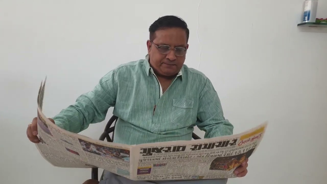 father reading news paper