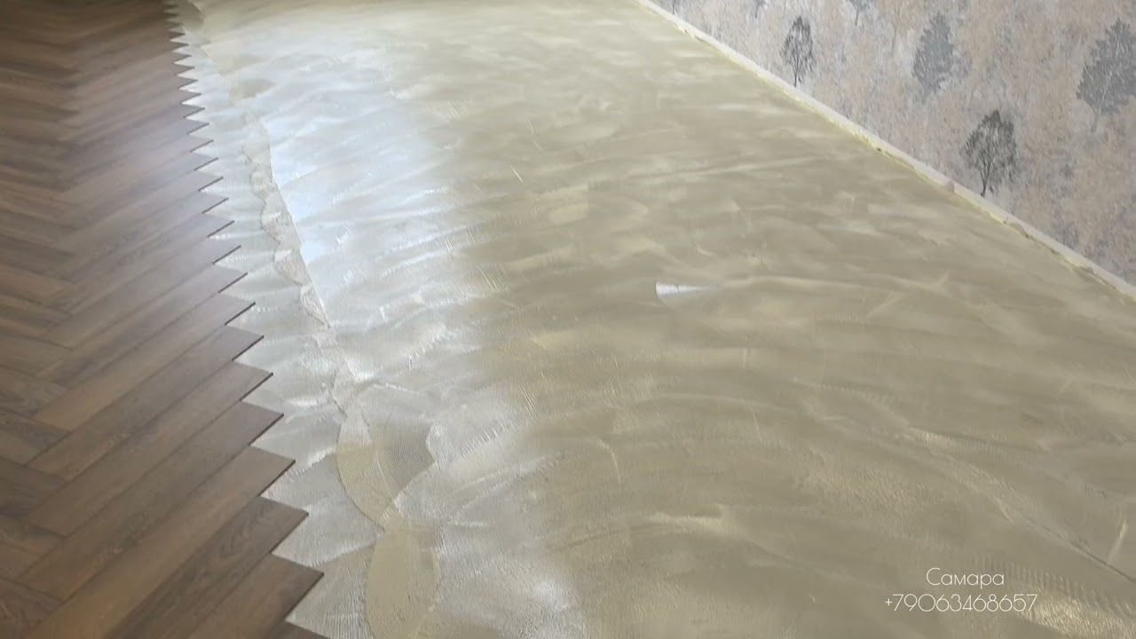 Укладка кварц виниловoй плитки LVT плитки Dami Floor ёлочкой на клей.