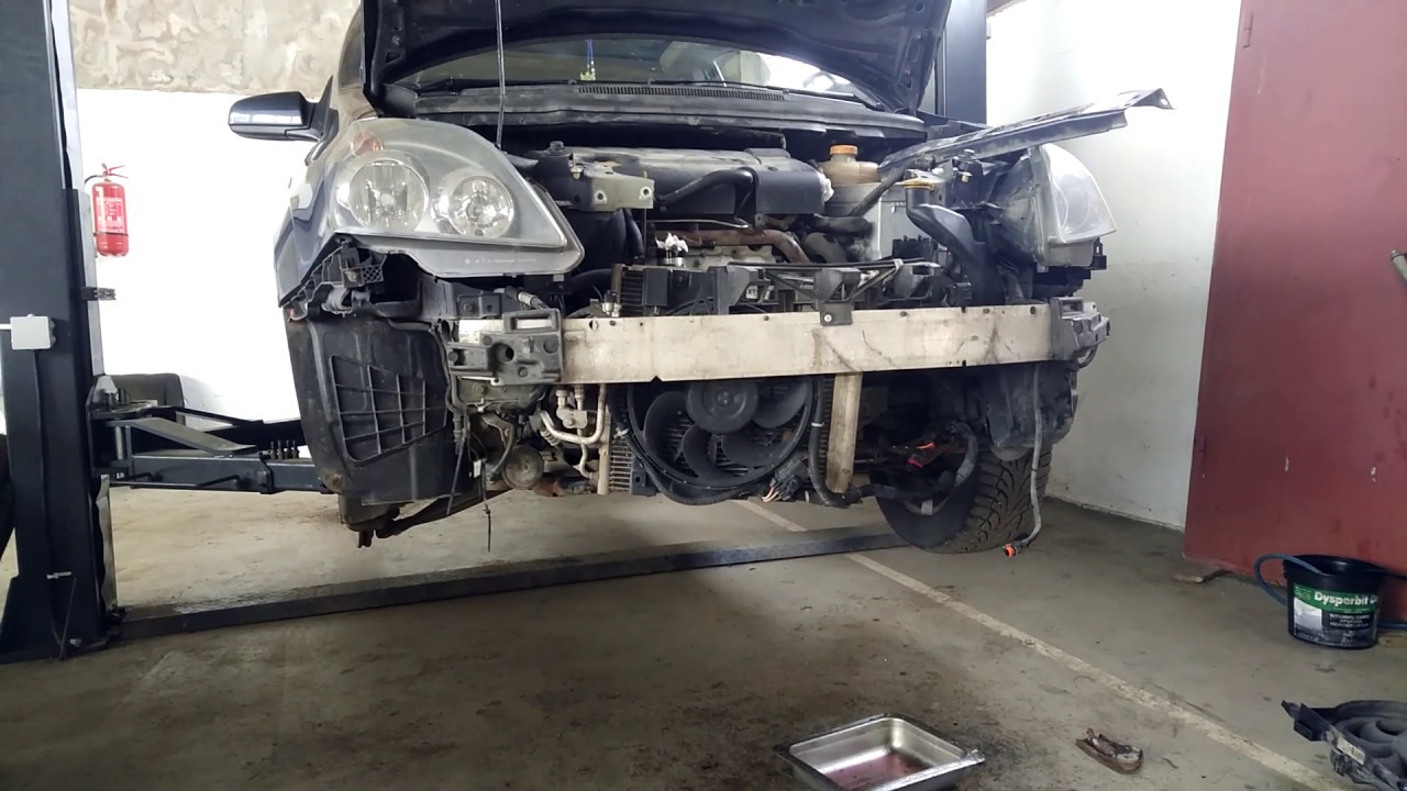 Opel Zafira B замена радиатора охлаждения.