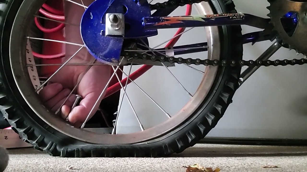 deflating my brother's 16-inch little bike