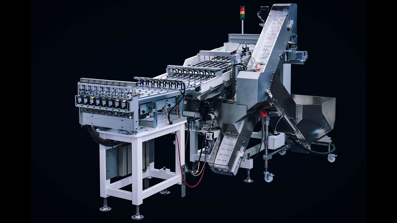 RNA FlexType L - lineare, flexible Zuführanlage für Kunststoffdeckel für die Lebensmittelindustrie