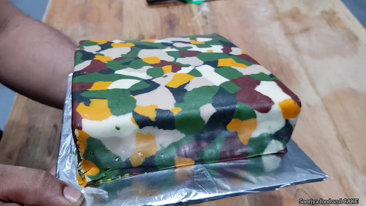 Creating a butter icing cake similar to an army costume designed for a little boy.