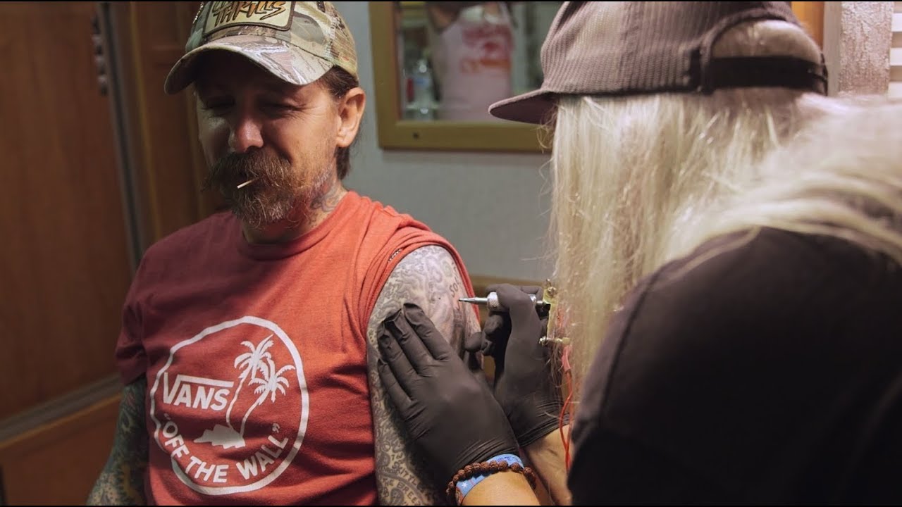Watch Dinosaur Jr.’s J. Mascis give Oliver Peck a tattoo