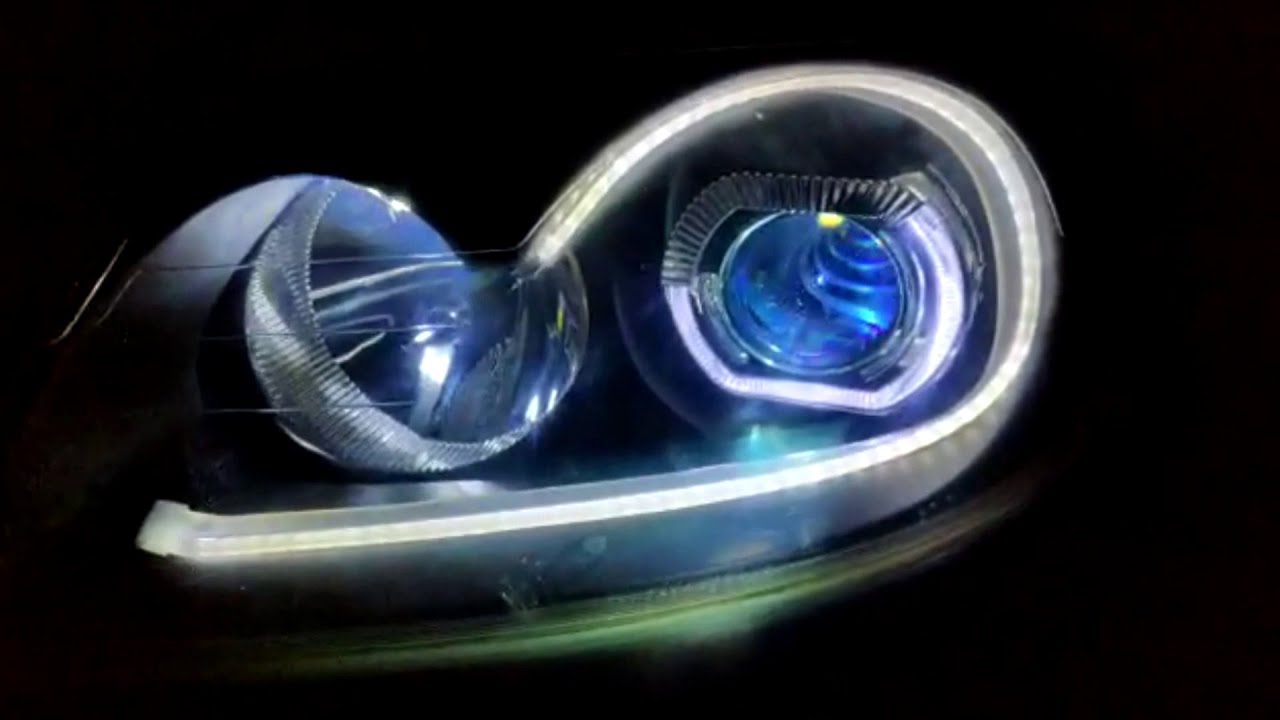 COLOQUEI PROJETOR DE BMW NO CLIO