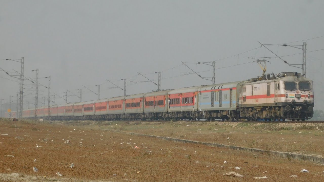 TKD WAP-7 Powering 12424 New Delhi - Dibrugarh Rajdhani Express Entering Into Teesta River Bridge
