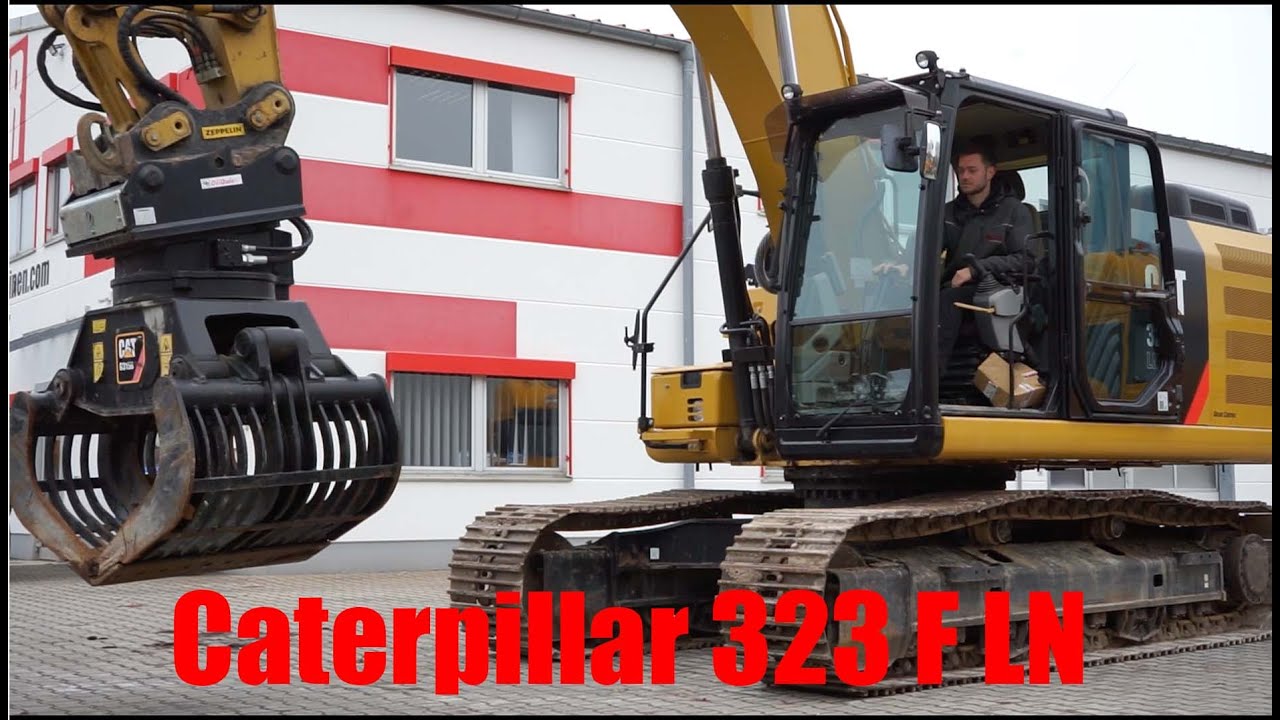 Mit richtig viel Werkzeug auf dem Bau! Caterpillar 323 F LN Kettenbagger