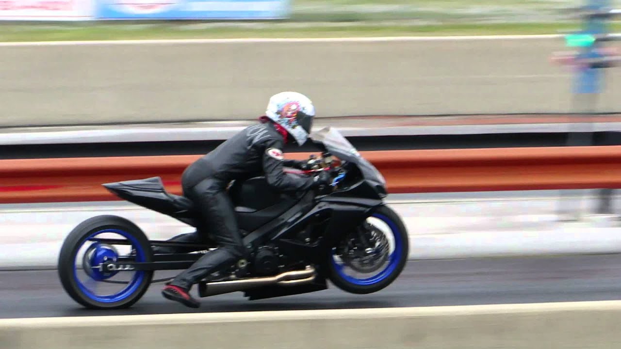 Female Motorcycle Drag Racer -Erika Allison racing her Suzuki 1000