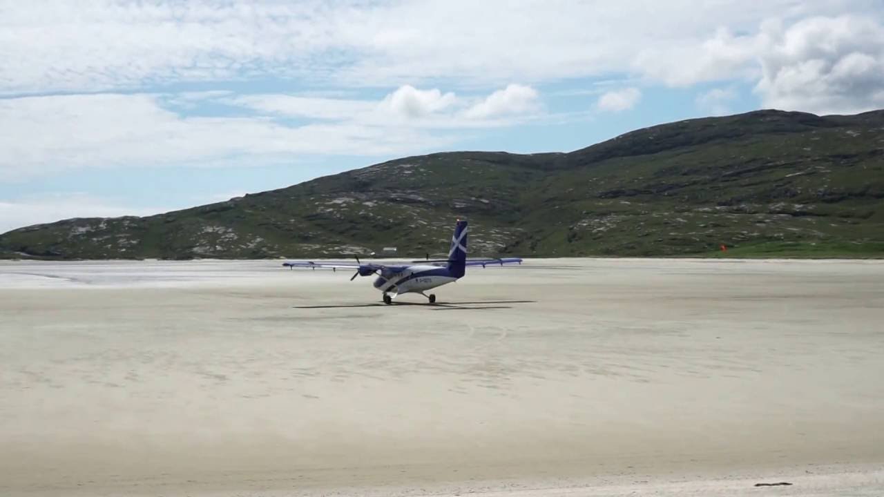 Plane taking off on the sand at Barra airport - Outer Hebrides