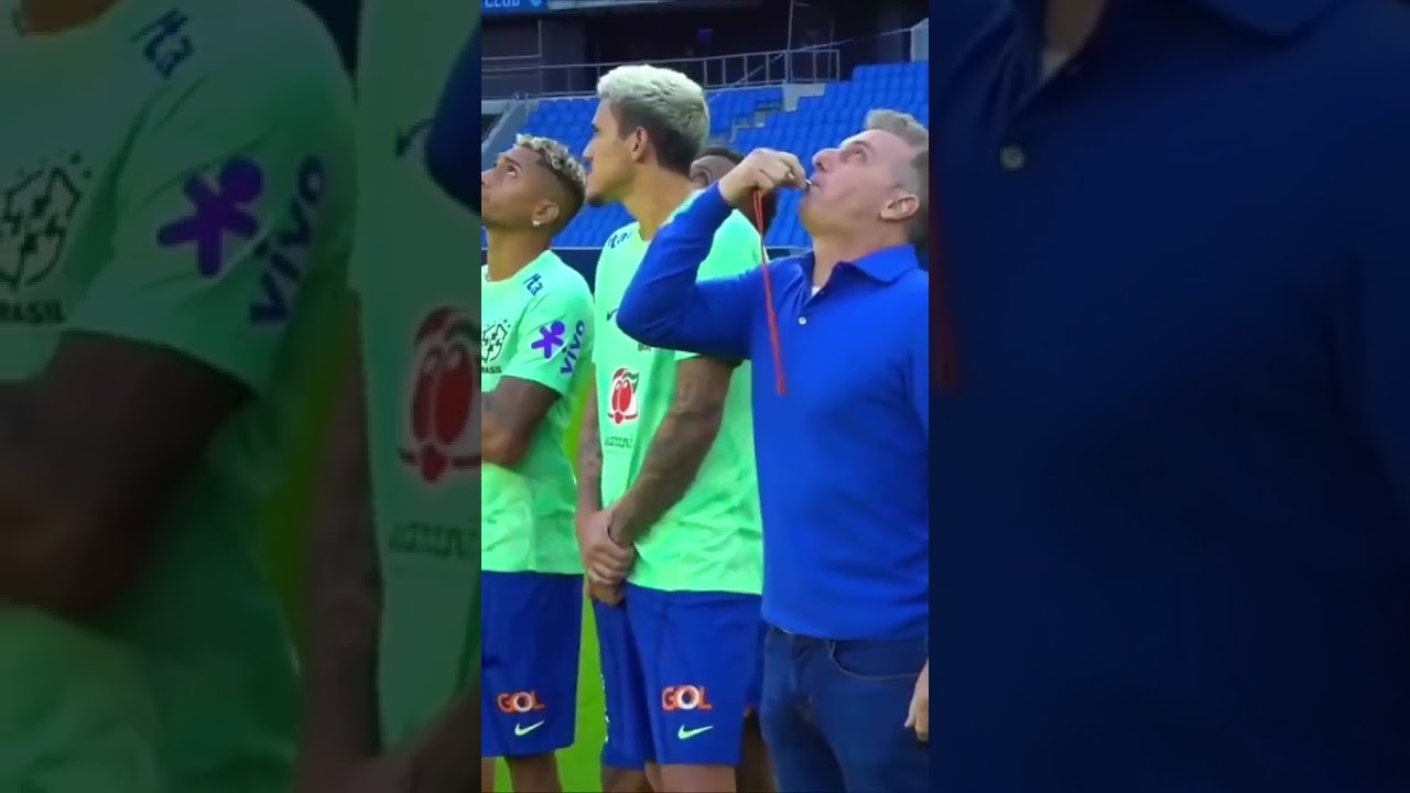 Brazil players trying to stop the ball dropped by a drone from a huge height.