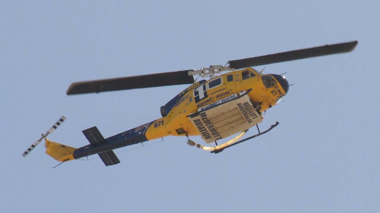 2015-01-26: Fire Helicopters - Bell 214B-1 (P2-MBH | Helitak 671) (N49732 | Helitak 672) (Photos)