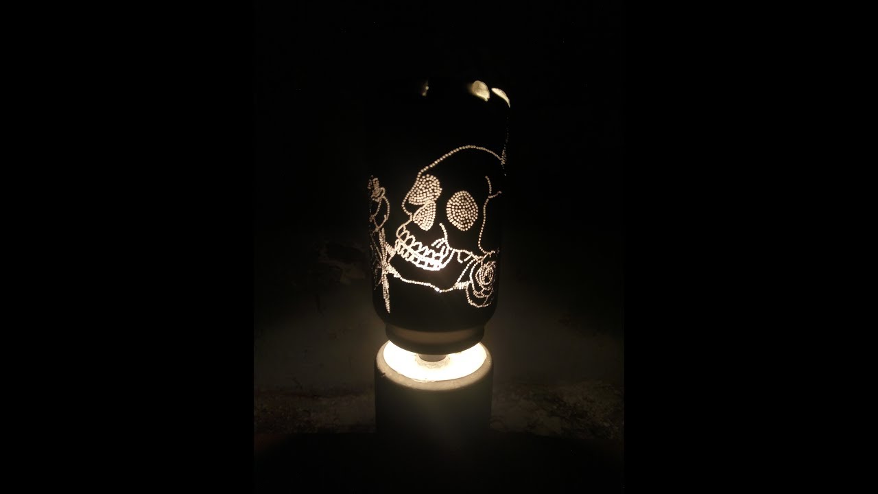 DIY rotating concrete lamp from coke cans