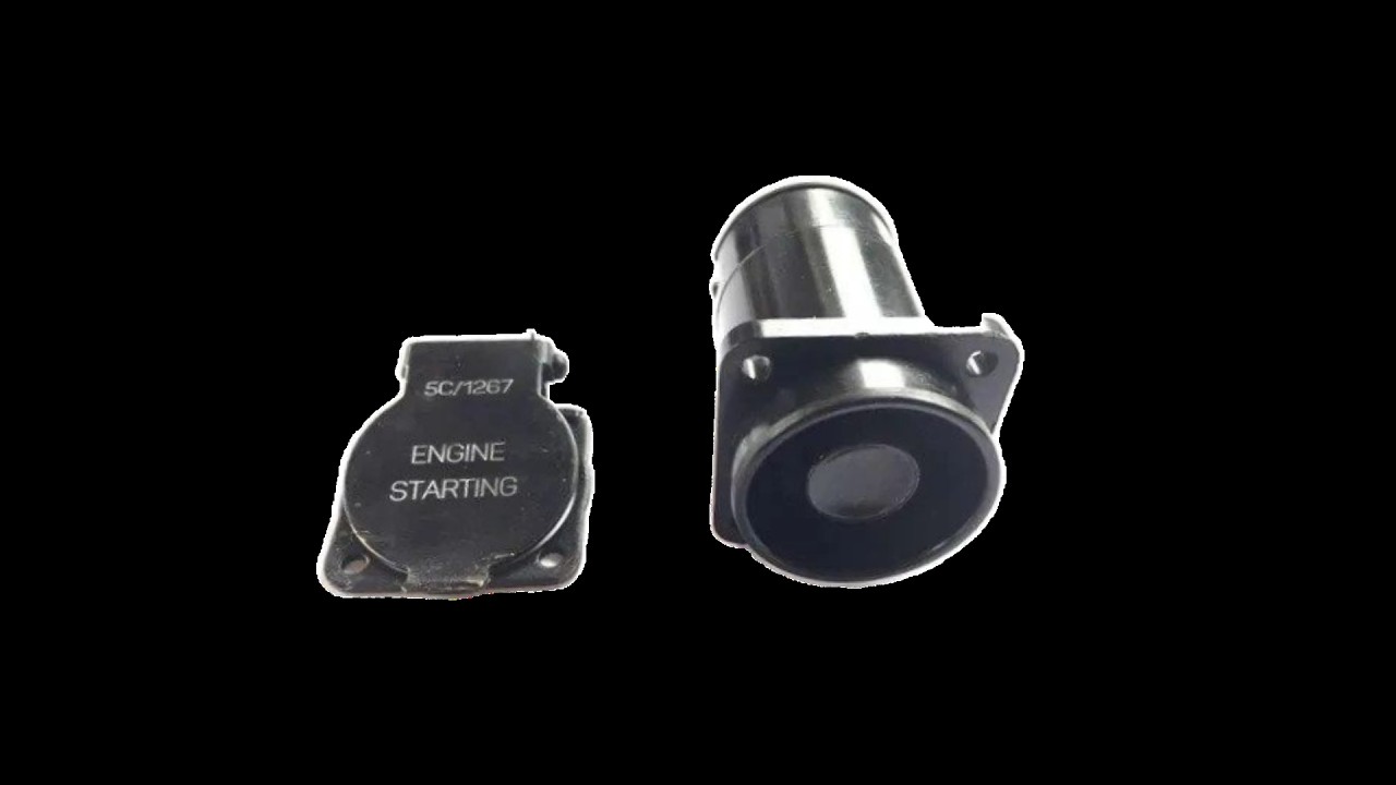 The Spitfire starter button with sprung cover.