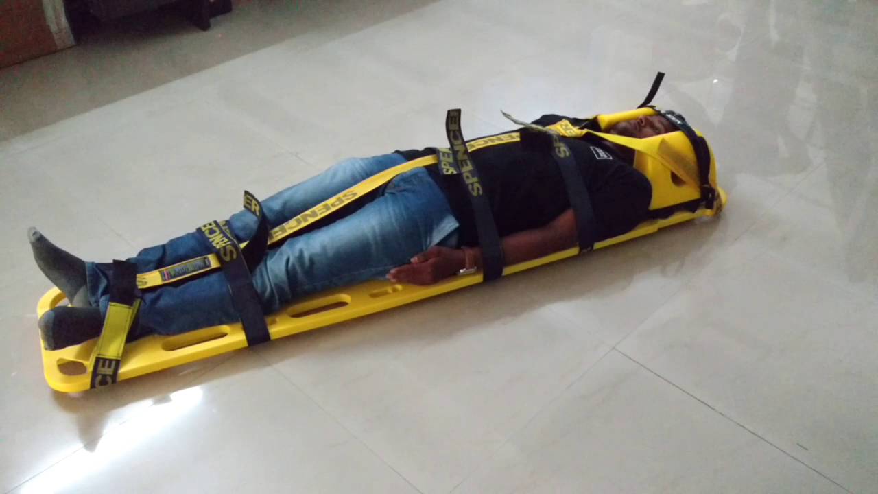 Spine board patient immobilisation