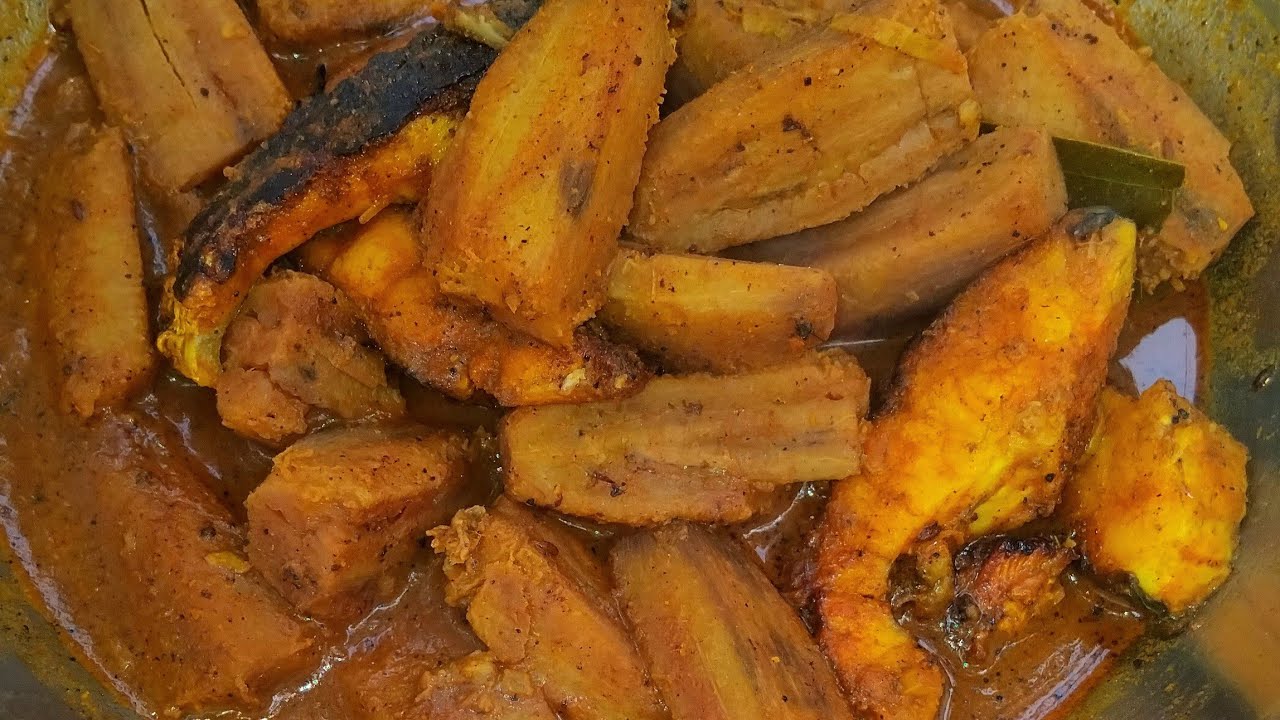 Fish curry with banana, cooked in a traditional Bangladeshi village style on a clay stove....